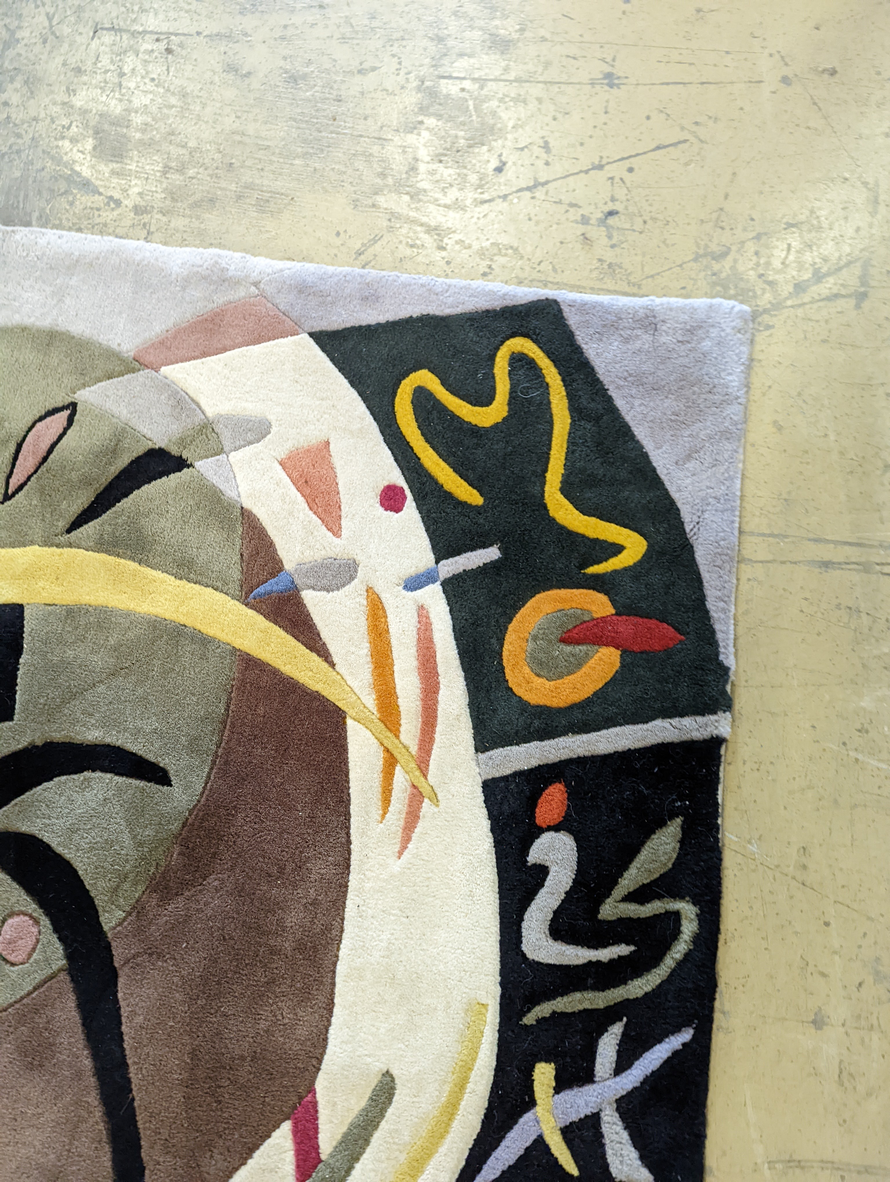 A contemporary Picasso inspired polychrome abstract pattern rug, 246 x 160cm